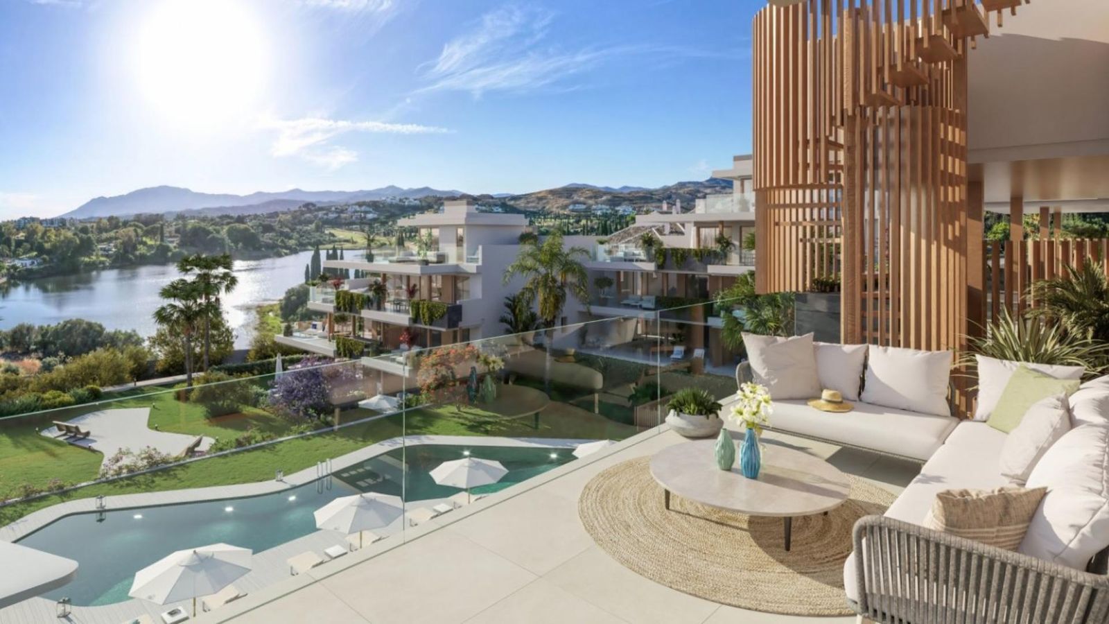 Luksusowy apartament z basenem i widokiem na jezioro z tarasu.